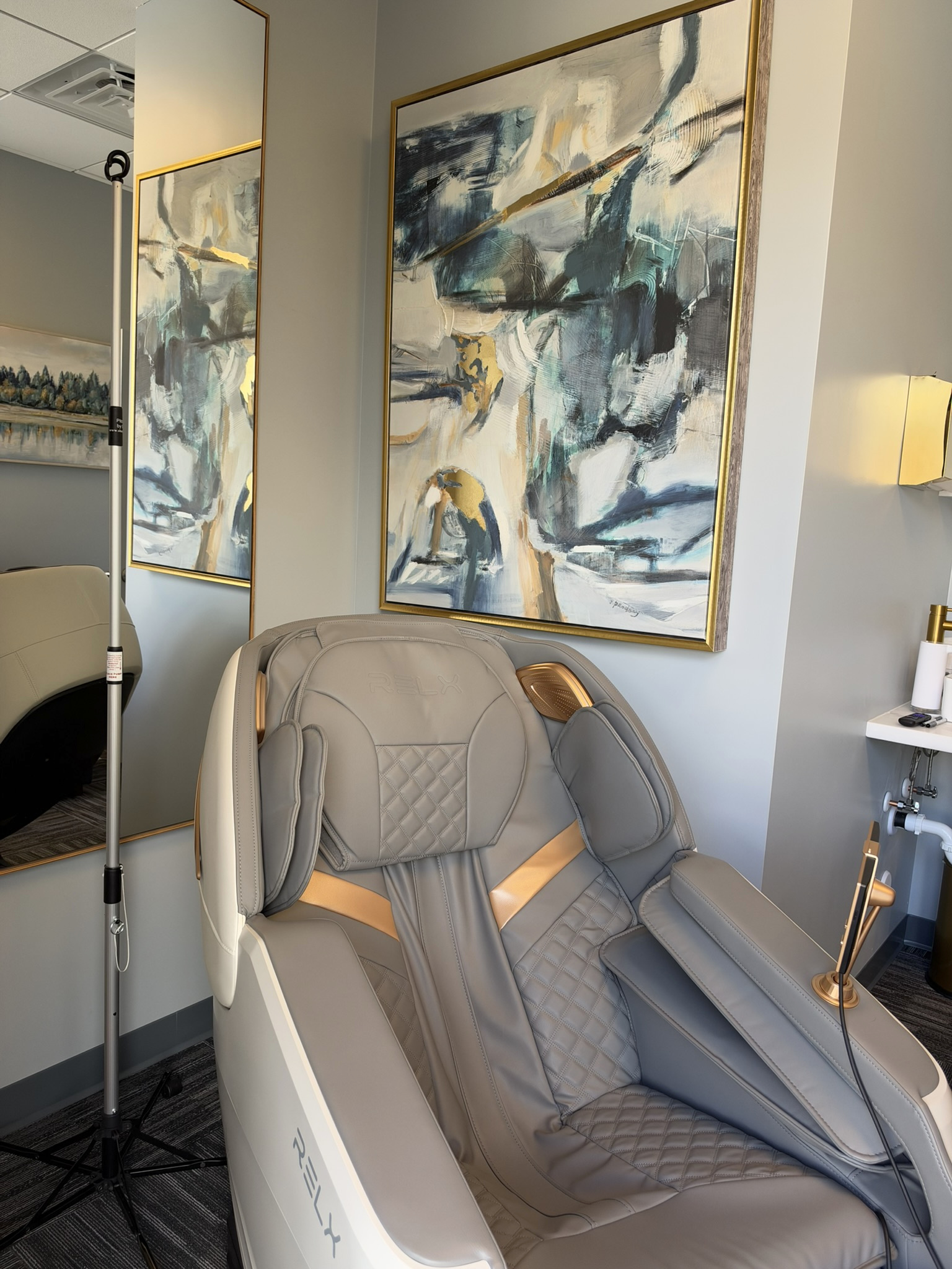 ZuVida infusion chair with an IV pole beside it