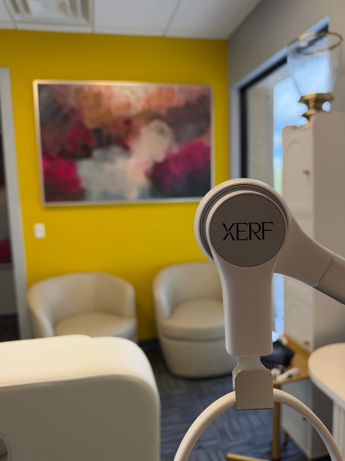 Xerf treatment handpiece in a ZuVida clinic treatment room